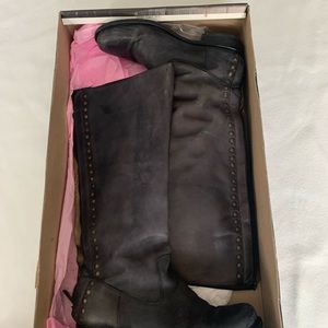 - Black leather tall riding women’s boots